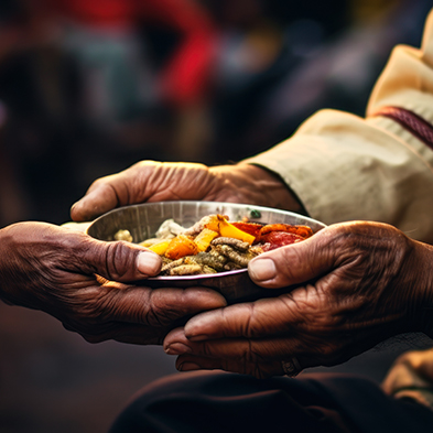 hands holding bowl of food to give to another person